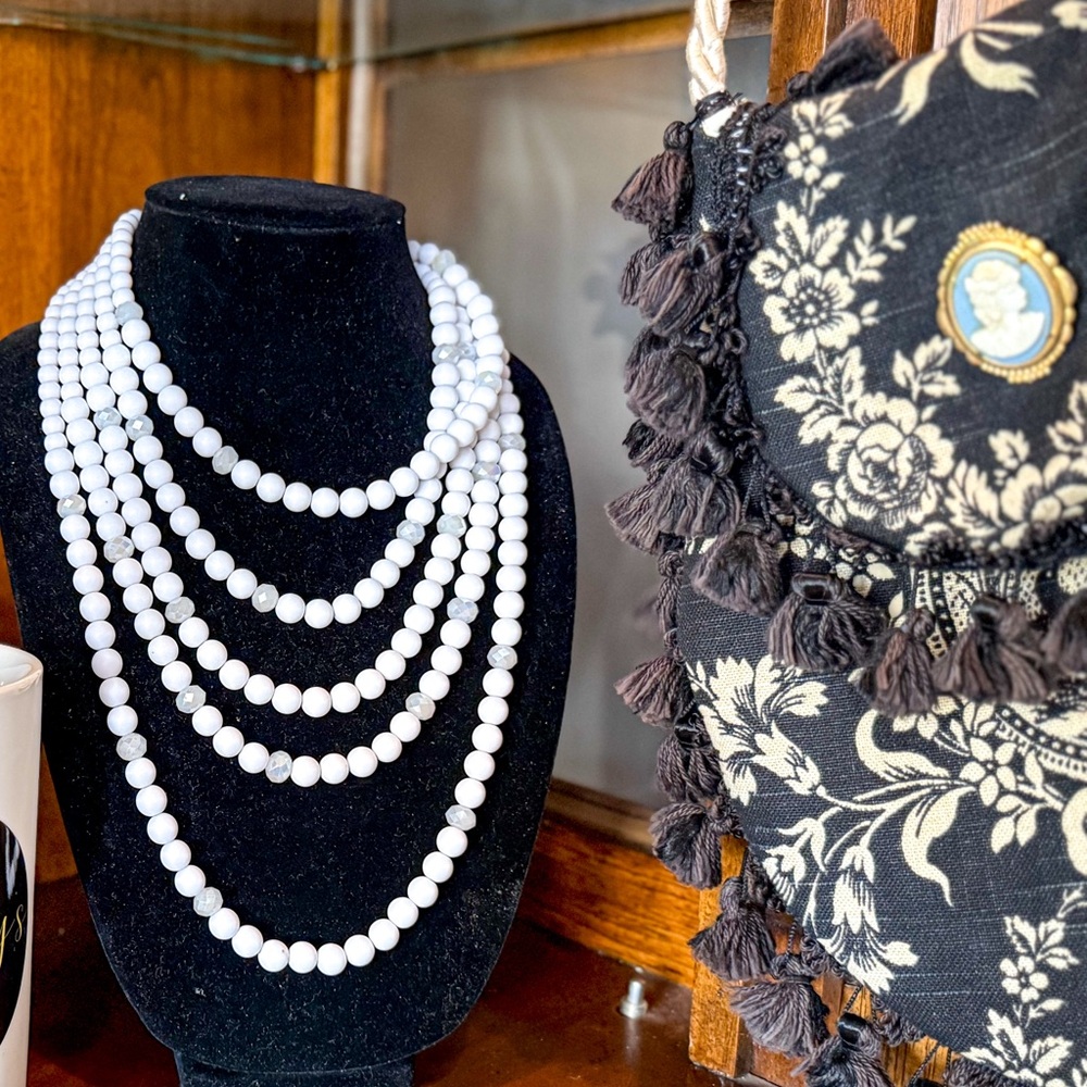White beaded multi strand necklace